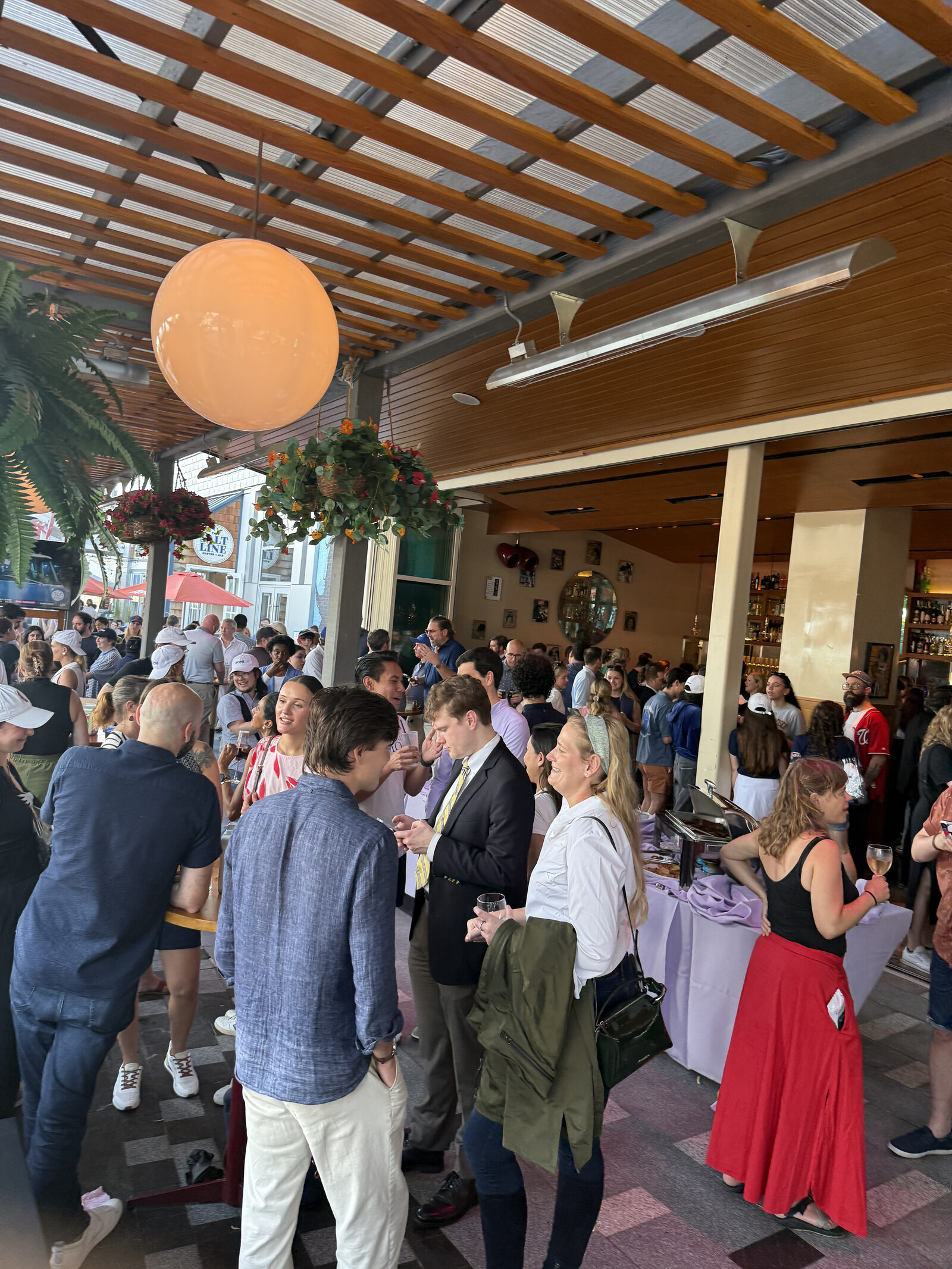 Wonk Week attendees networking at a social event